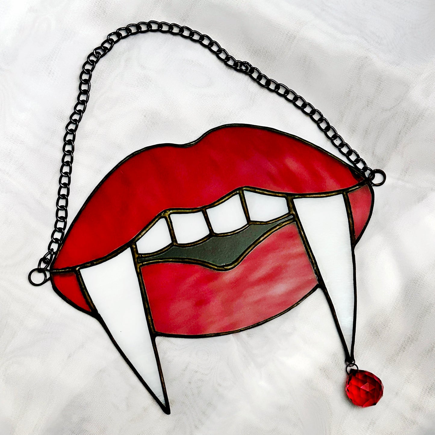 Red Vampire Teeth Suncatcher